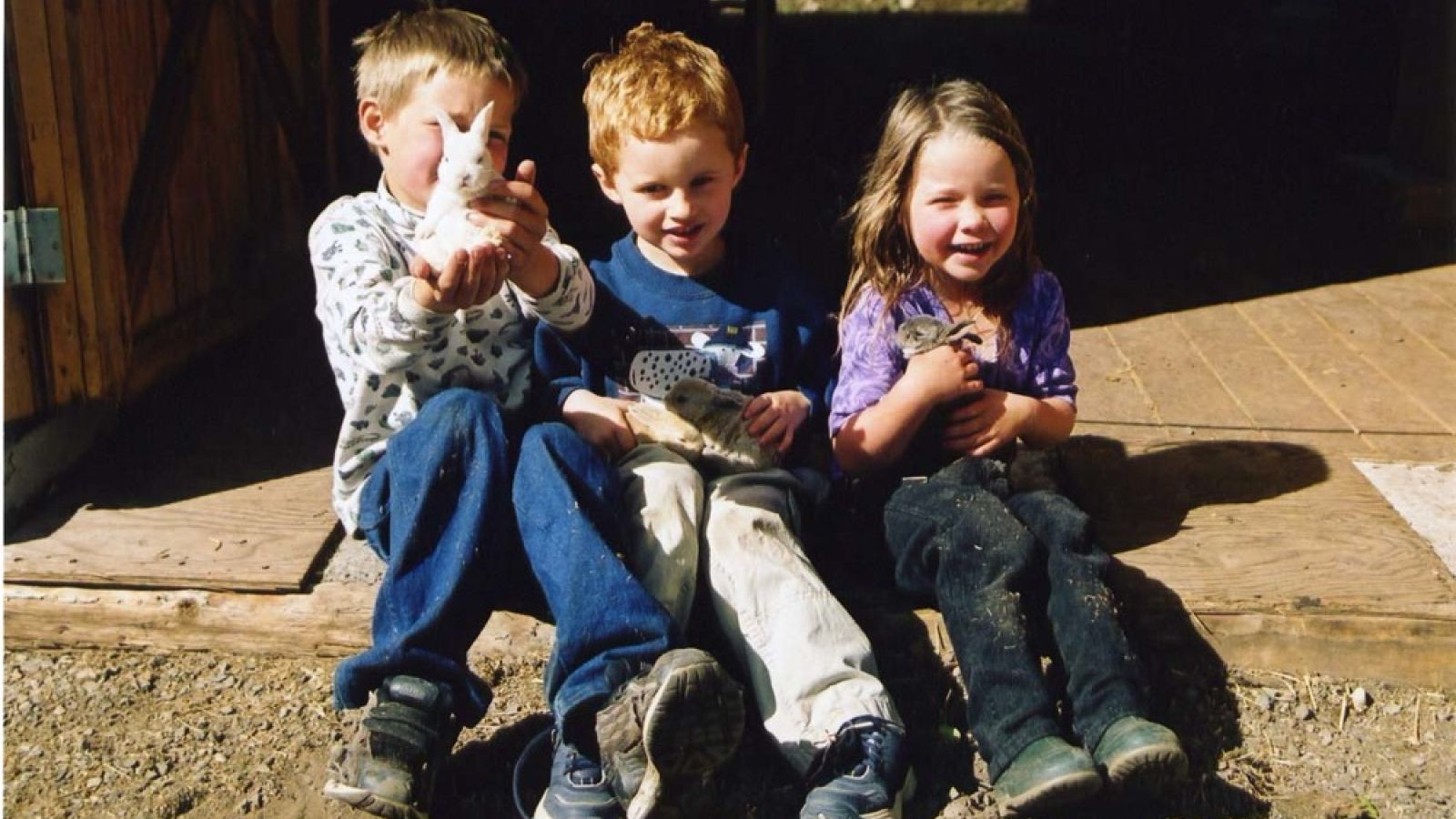 Kids and baby bunnies at Siwash Lake Ranch