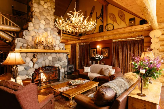 Reconnect, rest and relax in nature amid a rustic, yet elegant, great room at the cozy heart of this luxury guest ranch